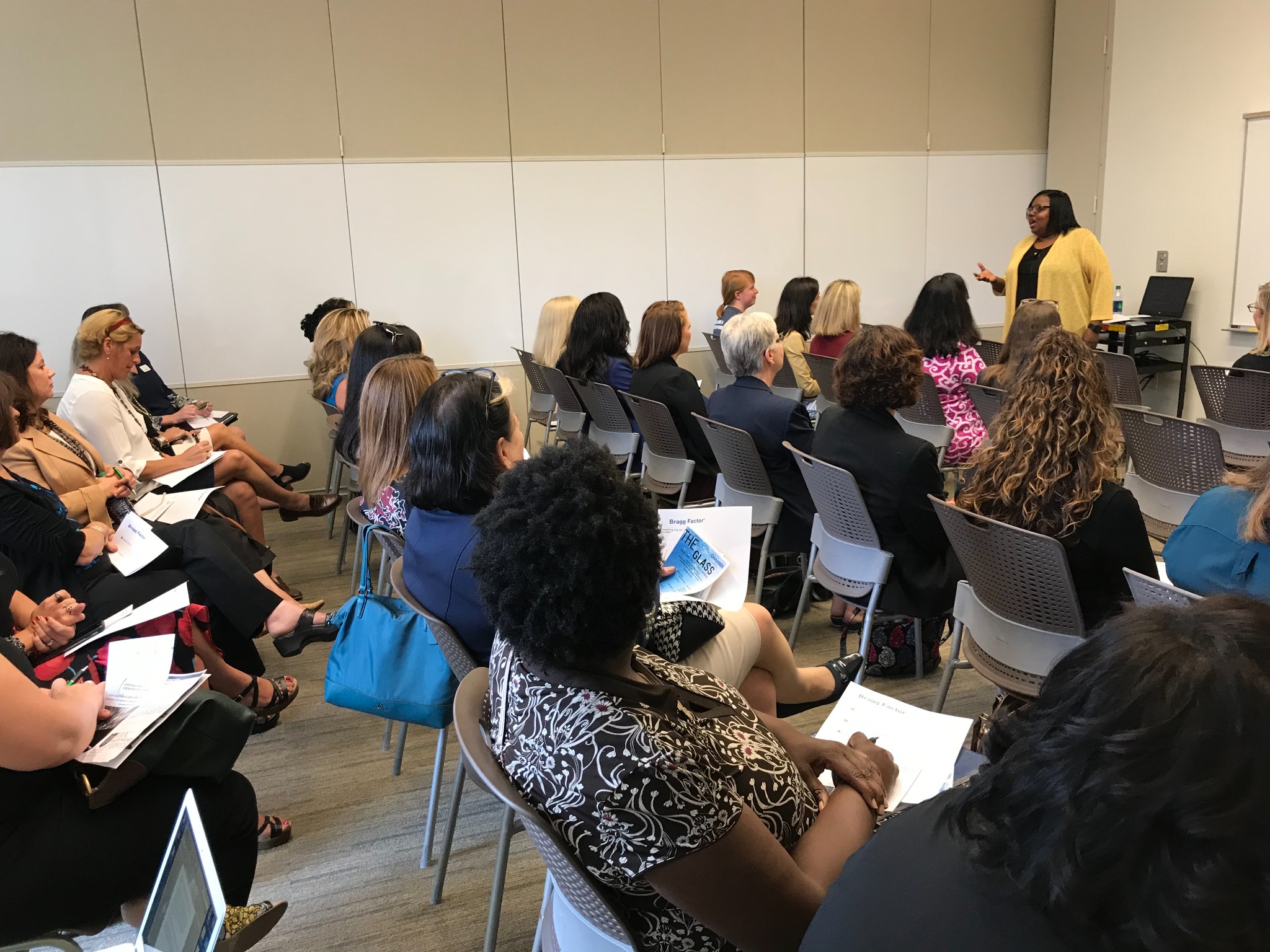 Dr. Winifred Bragg leading a business leadership workshop